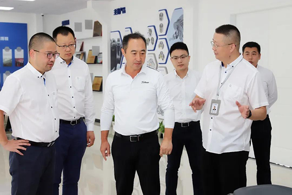 九阳股份董事长王旭宁来访公司考察交流_w66利来动态_w66利来集团